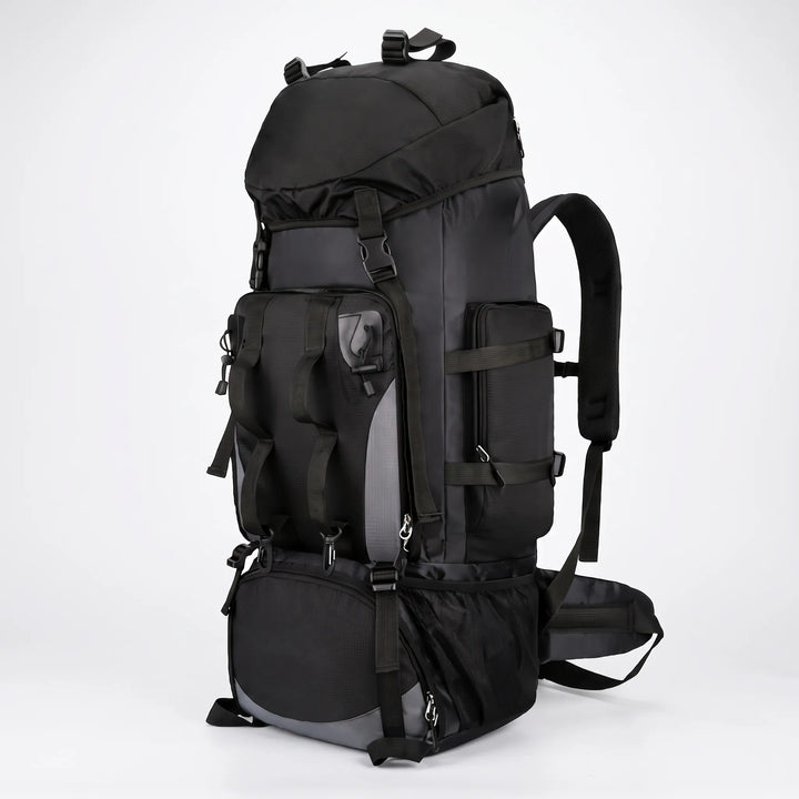 Front view: spacious unisex hiking backpack with multiple compartments & durable material for outdoor adventures.