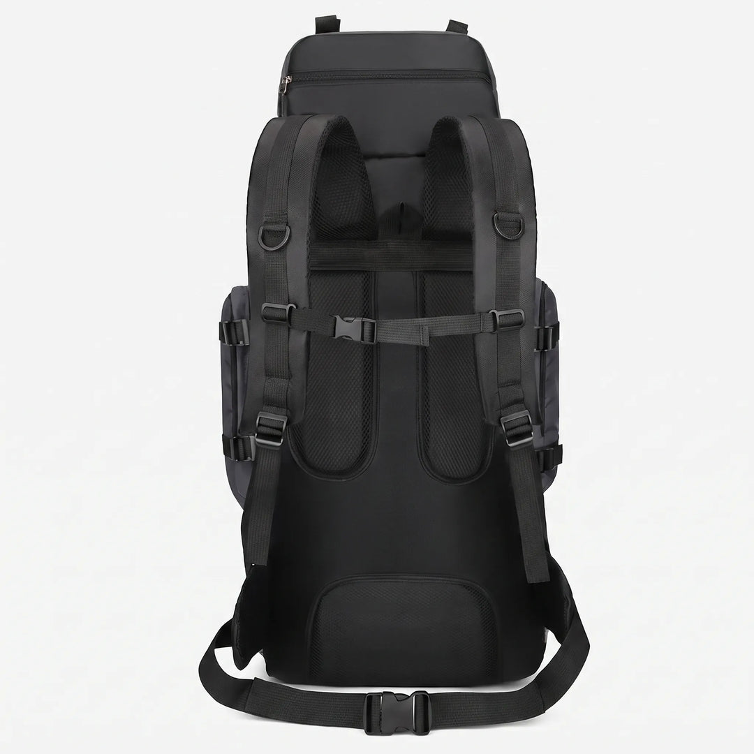 Side view of a large capacity unisex hiking backpack, highlighting strong straps & ample storage for trekking gear.