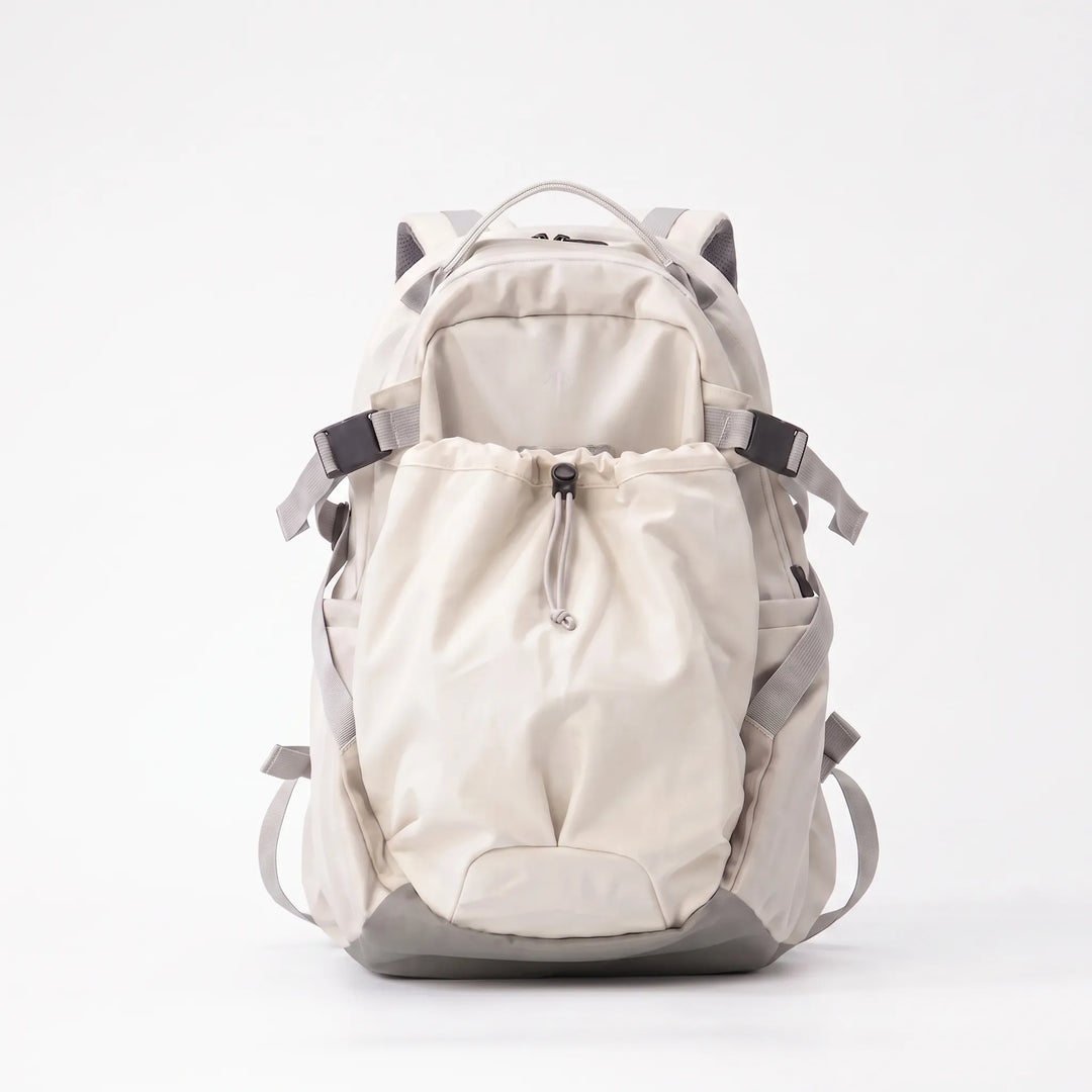 Detail of the rugged, water-resistant fabric of the large capacity hiking backpack, ensuring durability for outdoor travel.