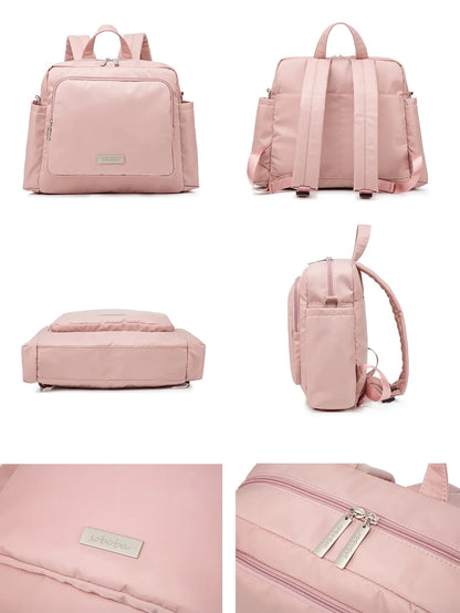 Unisex waterproof diaper backpack, demonstrating its capacity with various baby items arranged