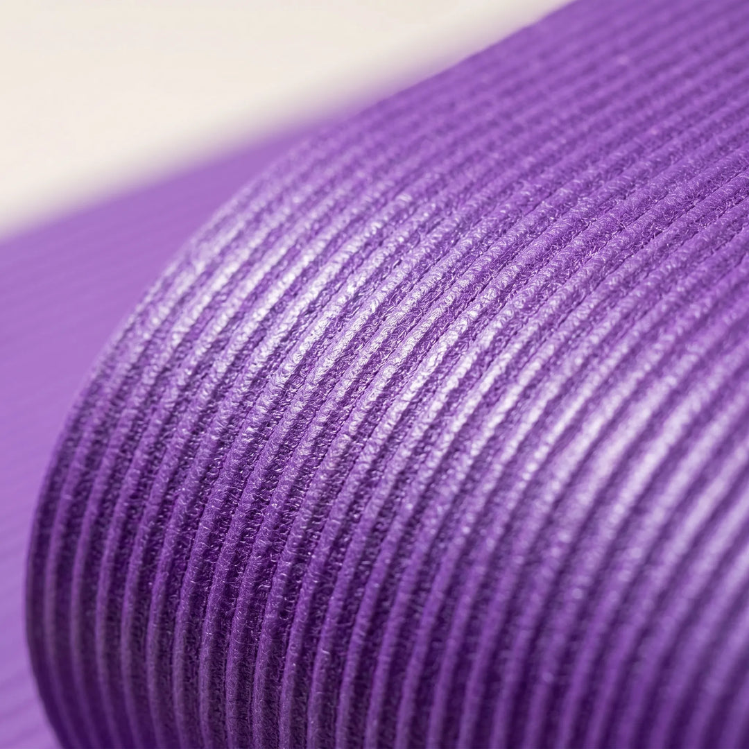 Durable, extra-thick unisex workout mat. Large non-slip design for safe home fitness, yoga, & pilates sessions.