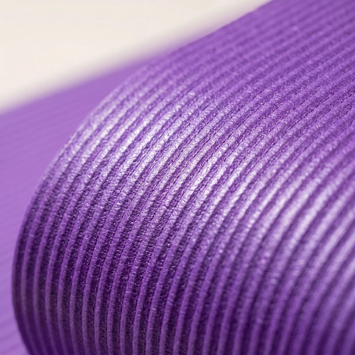 Durable, extra-thick unisex workout mat. Large non-slip design for safe home fitness, yoga, & pilates sessions.