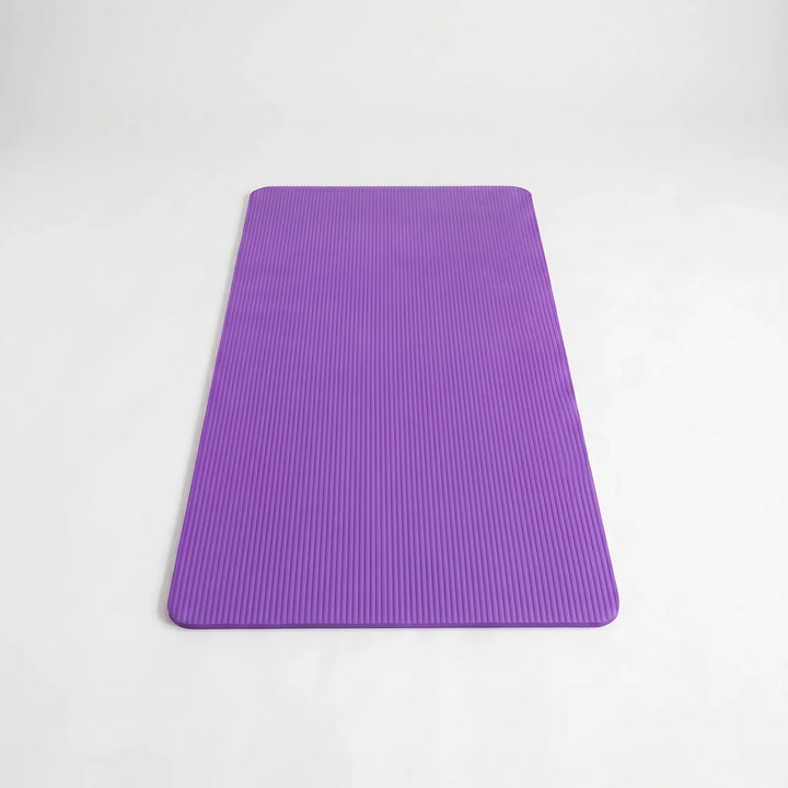Comfortable large fitness mat, thick and non-slip for home exercise, yoga & pilates. Supports joints during workouts.