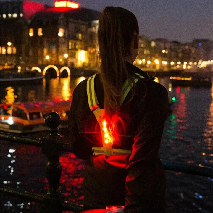 Rechargeable unisex LED reflective vest for ultimate night safety and visibility during any outdoor sport.