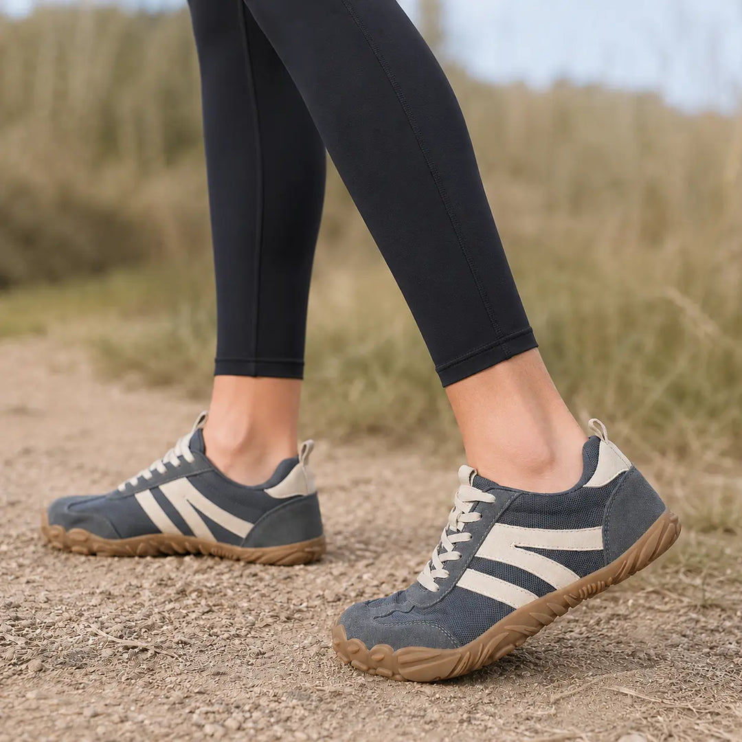 Unisex wide fit barefoot hiking shoes, lightweight, non-slip, perfect for natural trail exploration.