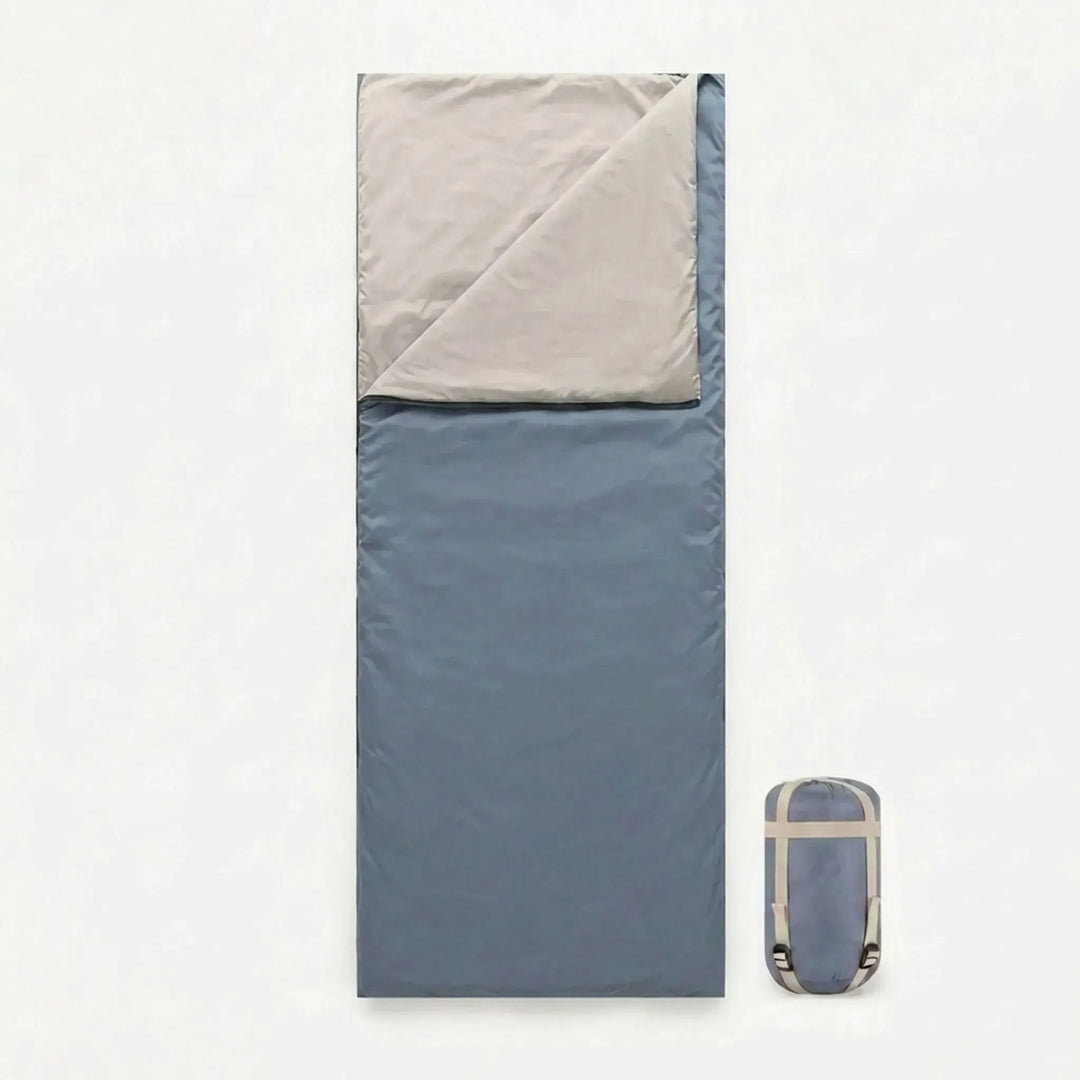 Compact brown summer sleeping bag for lightweight camping, hiking, and outdoor travel.