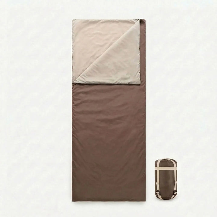 Lightweight brown sleeping bag for summer camping, hiking, and outdoor recreation.