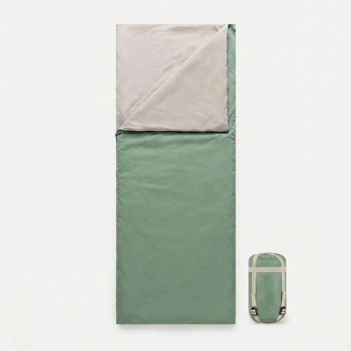 Versatile unisex brown sleeping bag, ideal for summer camping, hiking, and travel.
