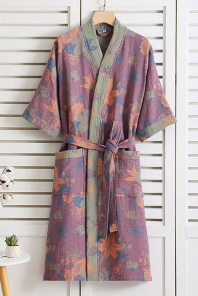 Comfortable unisex bathrobe featuring a tie waist. Ideal lightweight loungewear for ultimate relaxation.