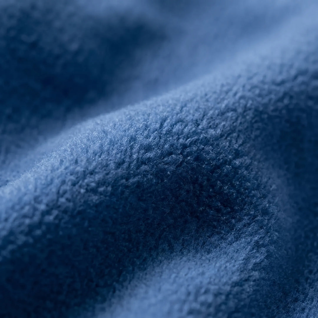 Cozy fleece sleeping bag liner for camping and outdoor adventures. Lightweight, compact, and provides added warmth.