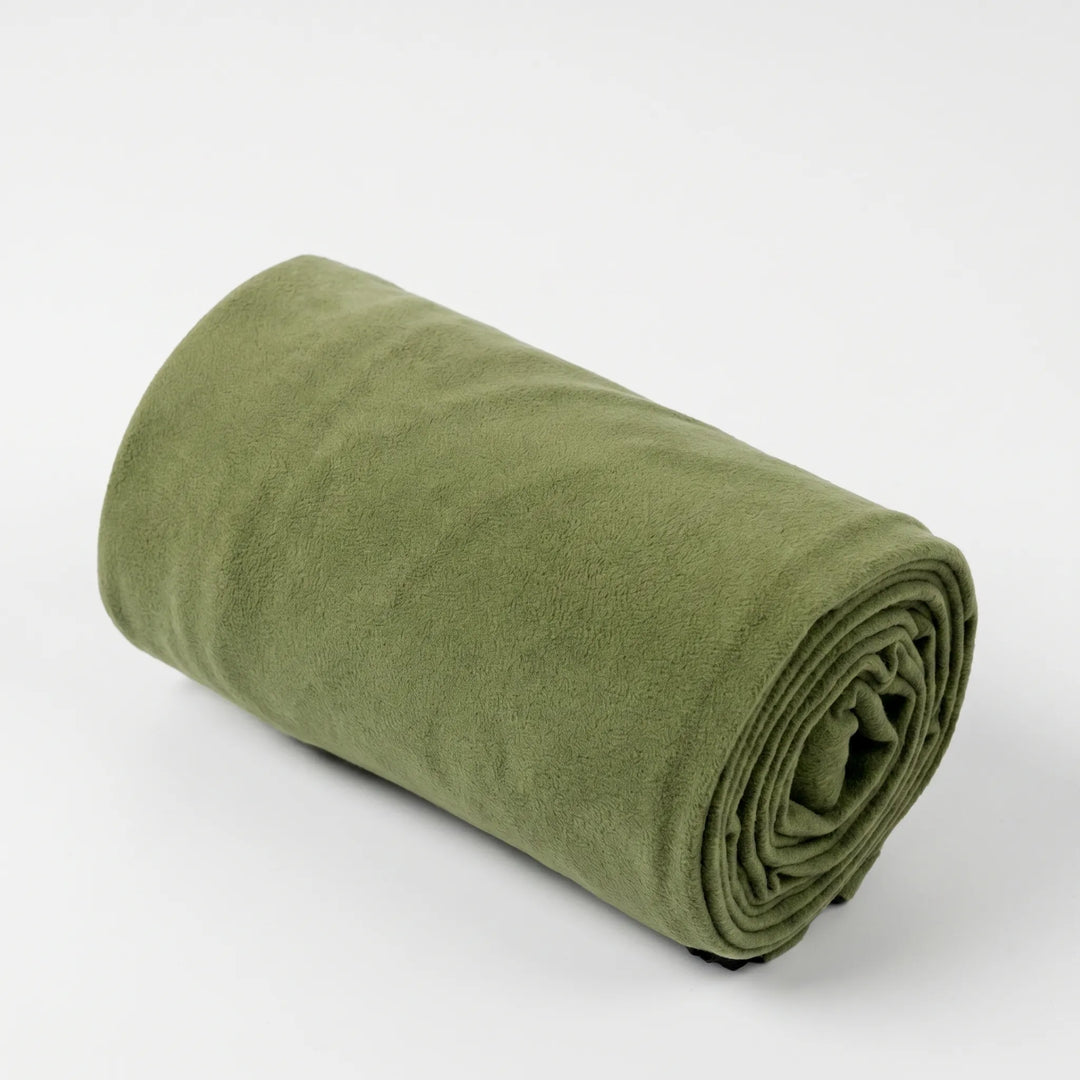 Compact fleece sleeping bag liner, perfect for boosting sleeping bag warmth during cold camping or hiking nights.