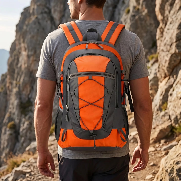Unisex lightweight hiking backpack in black, perfect for outdoor trails & day trips. Durable nylon daypack.