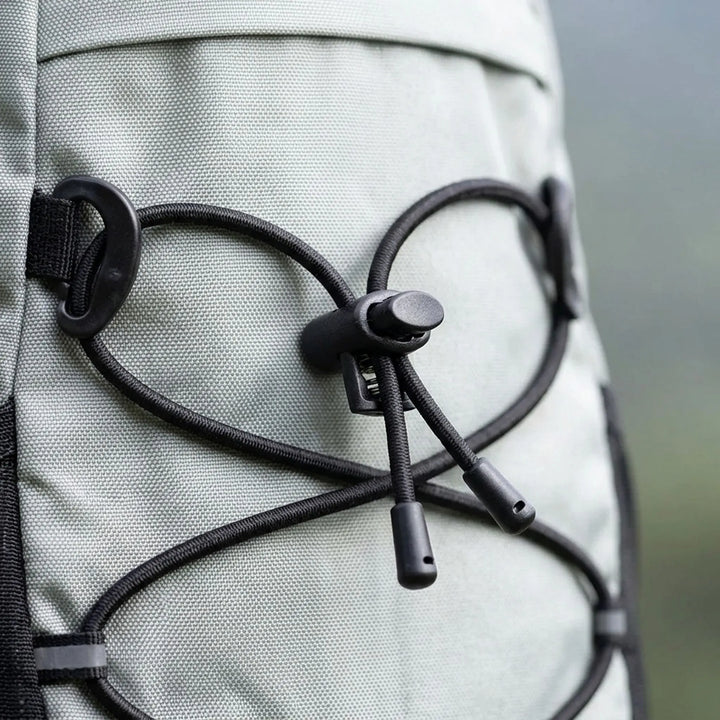 Ergonomic back of a unisex lightweight hiking daypack with padded straps. Comfort for trail & camping adventures.