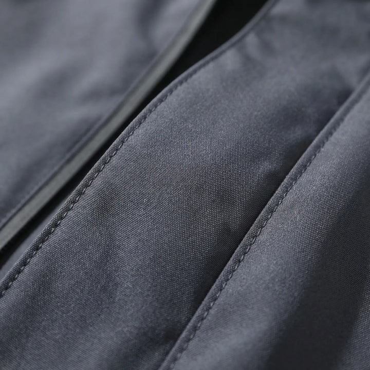 Unisex hooded hiking rain jacket, lightweight & windproof, offering all-weather protection for trails.