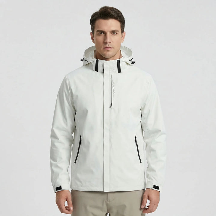 Water-repellent unisex lightweight rain jacket with adjustable hood, designed for active outdoor wear.