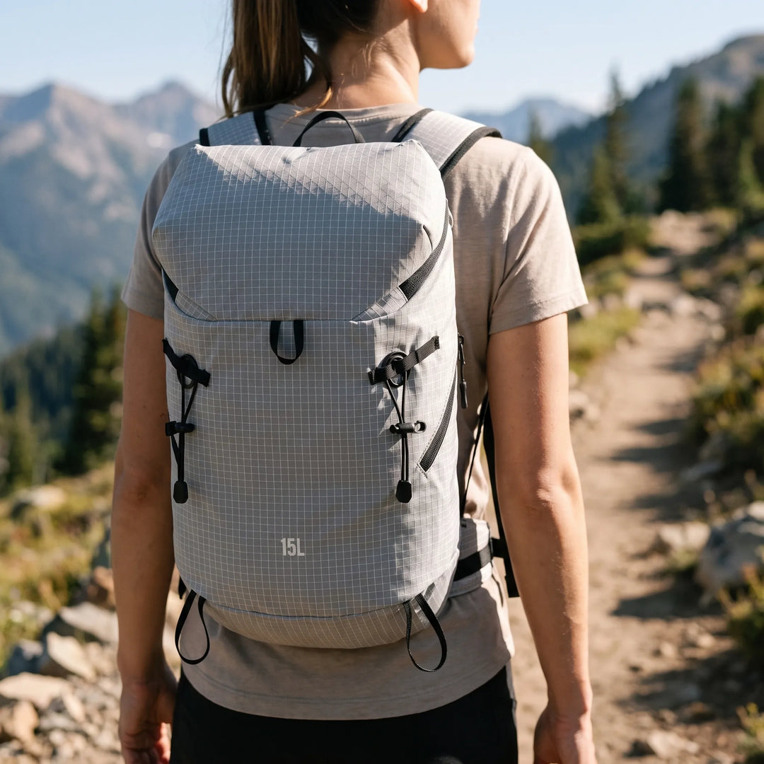 Unisex lightweight hydration pack for hiking & trail running, essential outdoor gear for adventures.