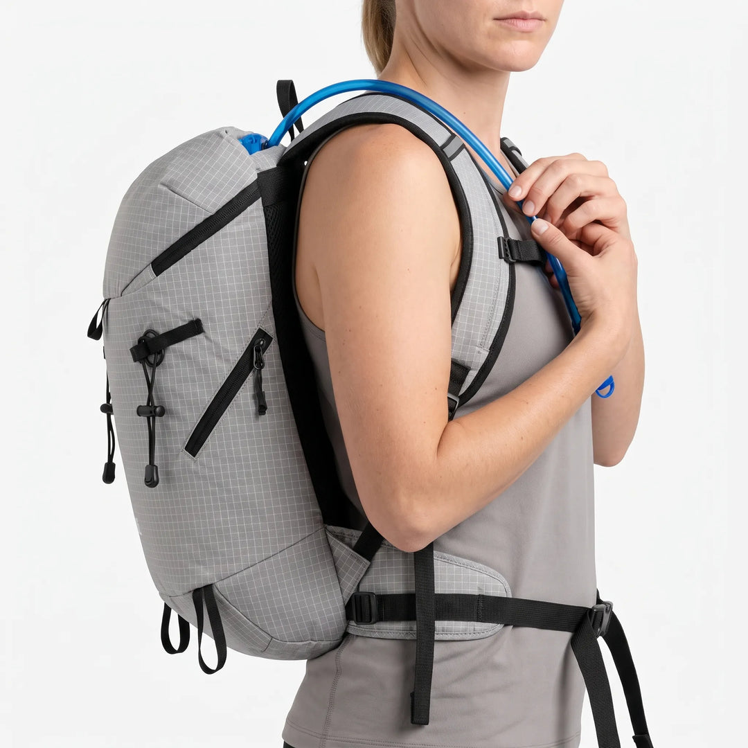 Durable unisex hiking backpack with hydration bladder compartment, essential for long trails.