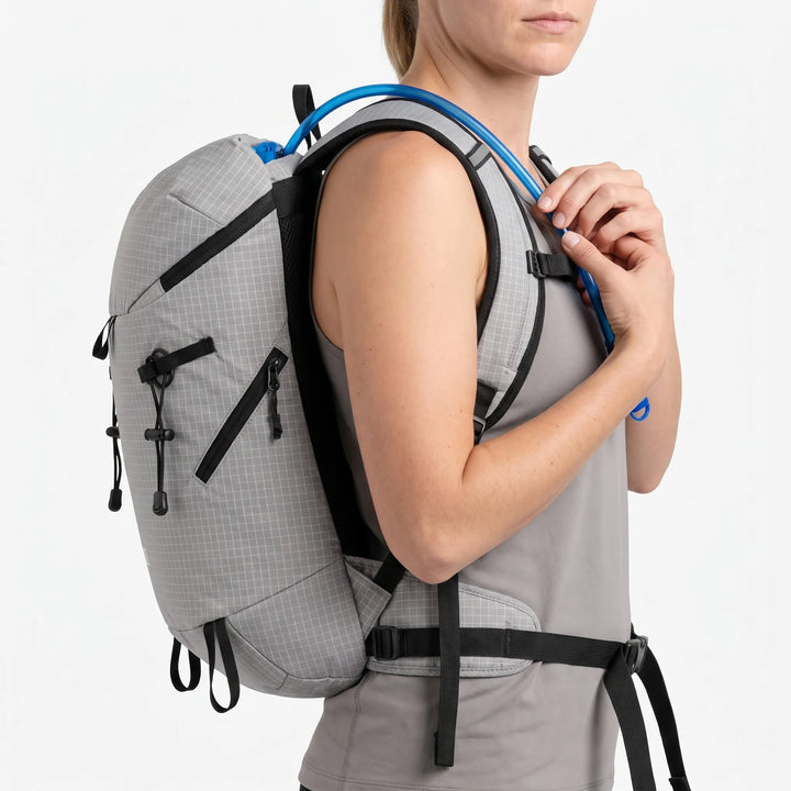 Durable unisex hiking backpack with hydration bladder compartment, essential for long trails.