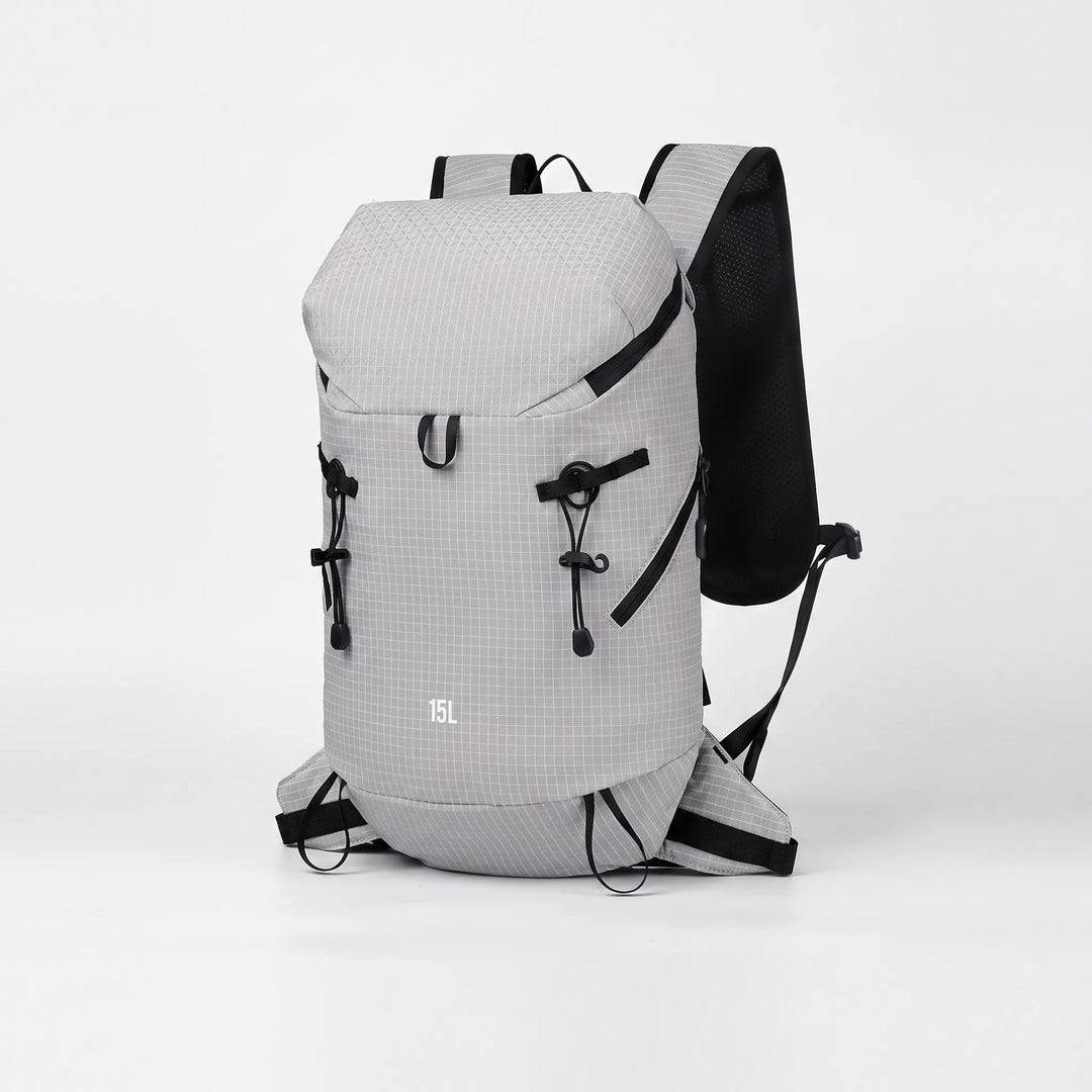 Versatile unisex hydration pack for hiking, camping & adventure, made with lightweight fabric.