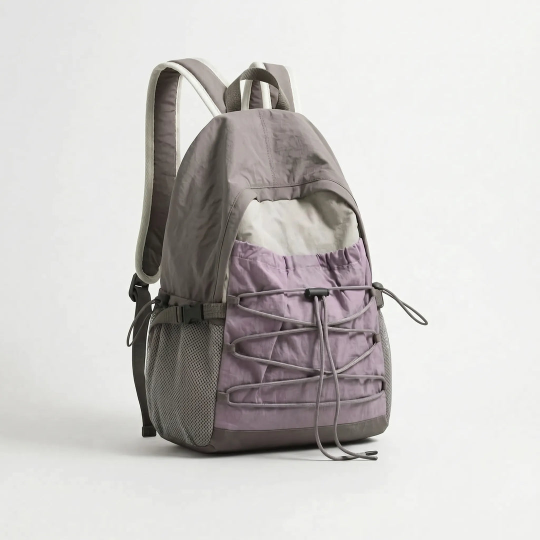 Adventure-ready unisex backpack, lightweight nylon for outdoor travel, hiking, & daily commute.