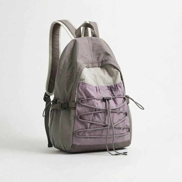 Adventure-ready unisex backpack, lightweight nylon for outdoor travel, hiking, & daily commute.