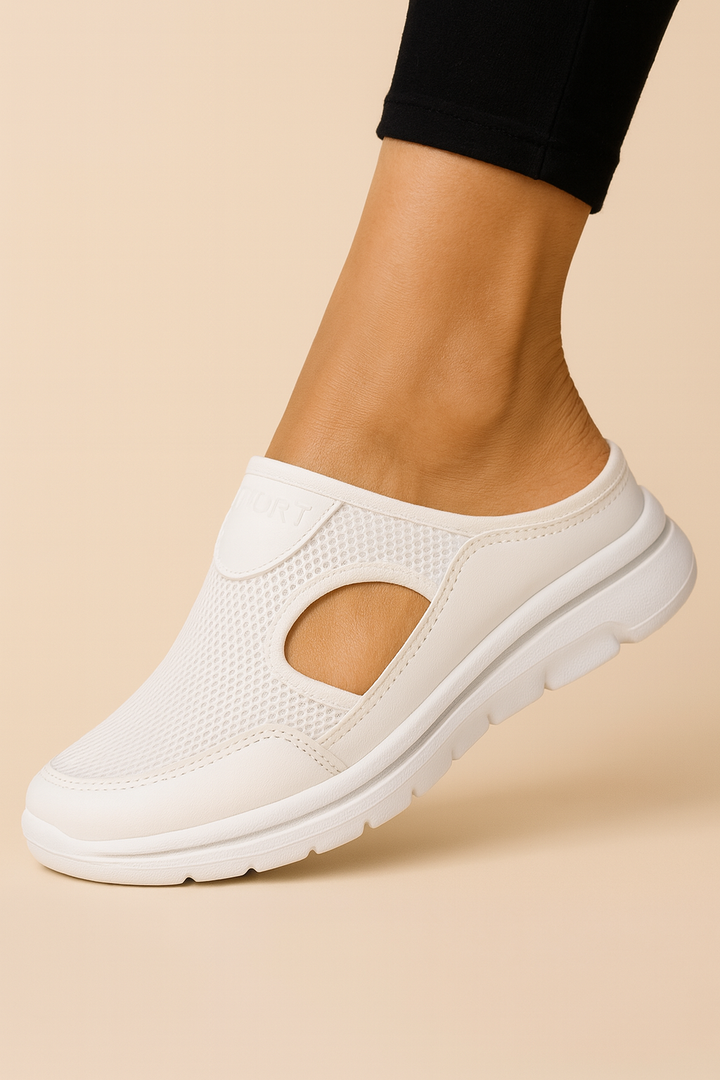 Grey orthopedic comfort slippers with cushioned footbed, offering lightweight support for men & women.
