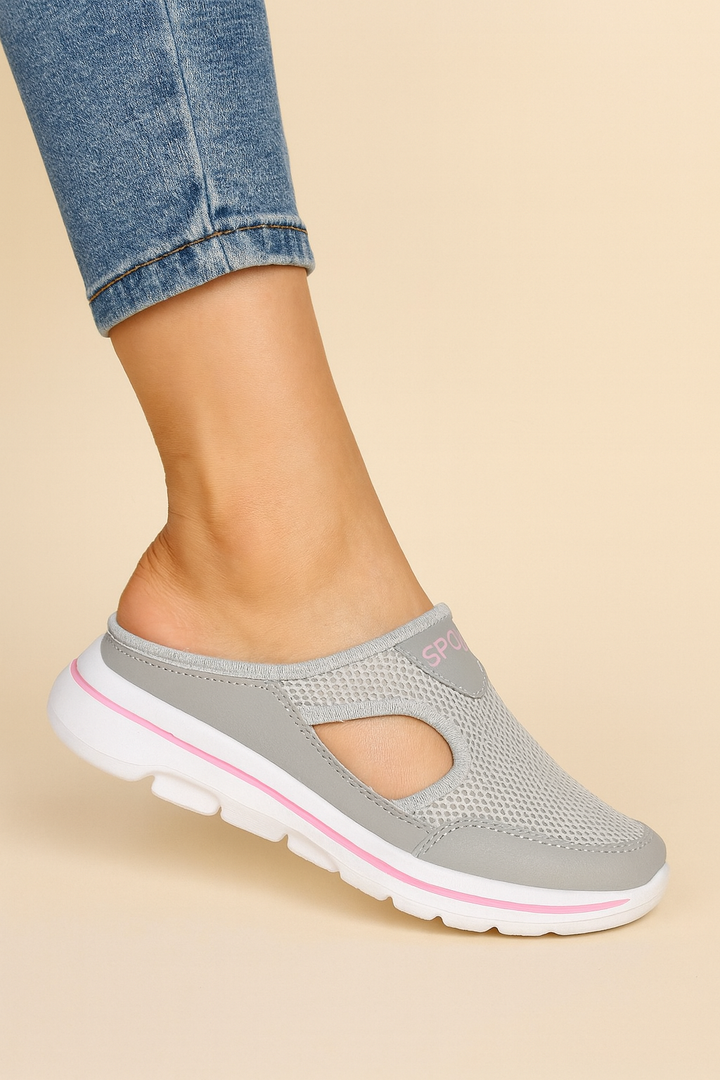 Slip-on home wear slippers for ultimate foot comfort, featuring a breathable design and orthopedic support.