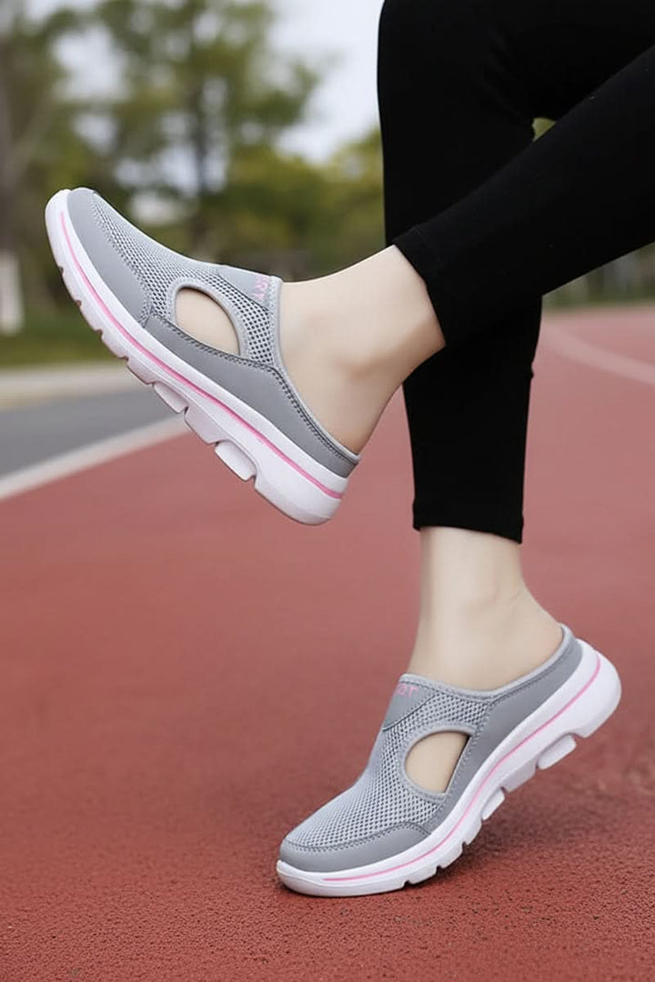 Comfortable unisex house slippers with arch support and lightweight construction for daily relief.