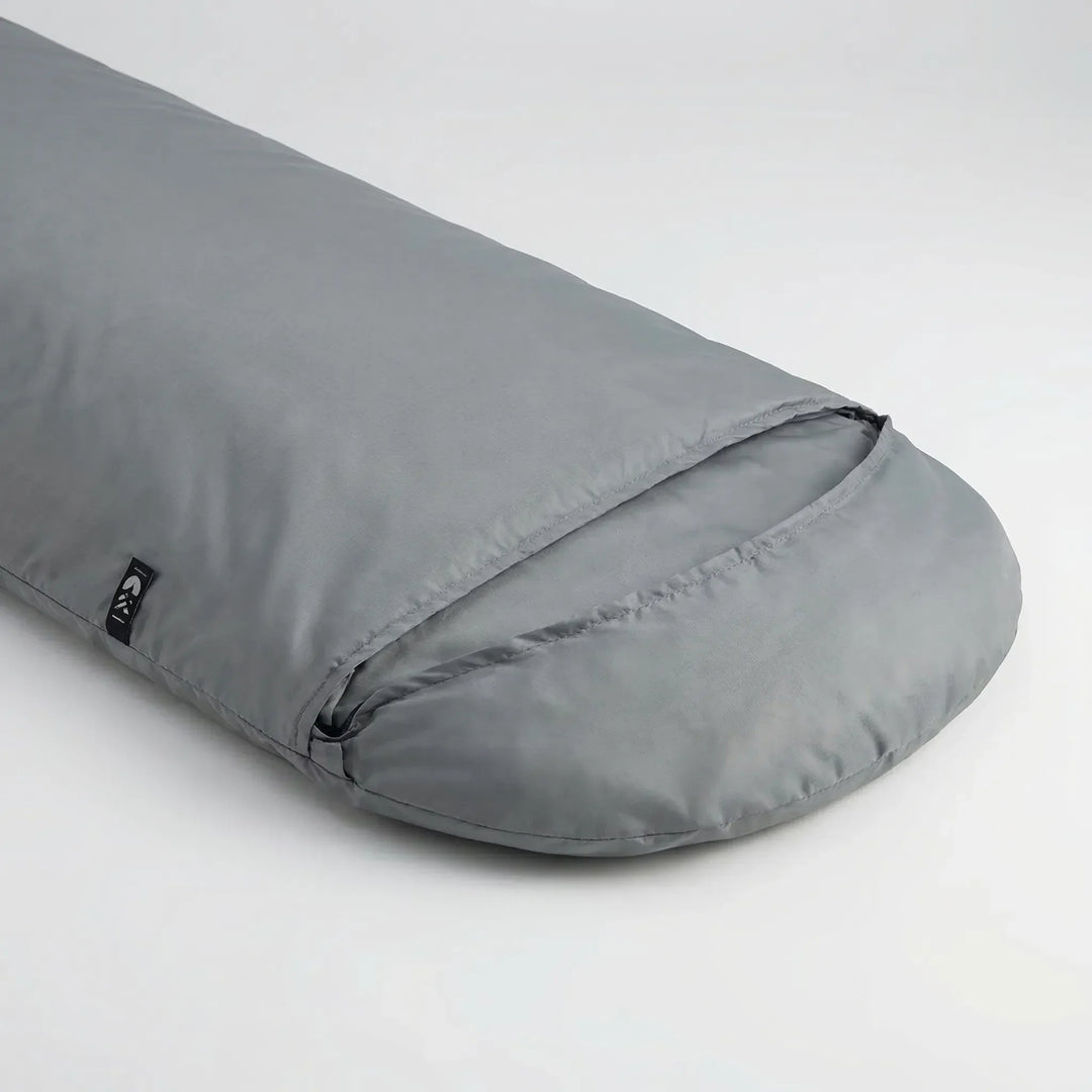 Durable, smooth rectangular sleeping bag liner for hygienic outdoor sleeping, travel, and camping.