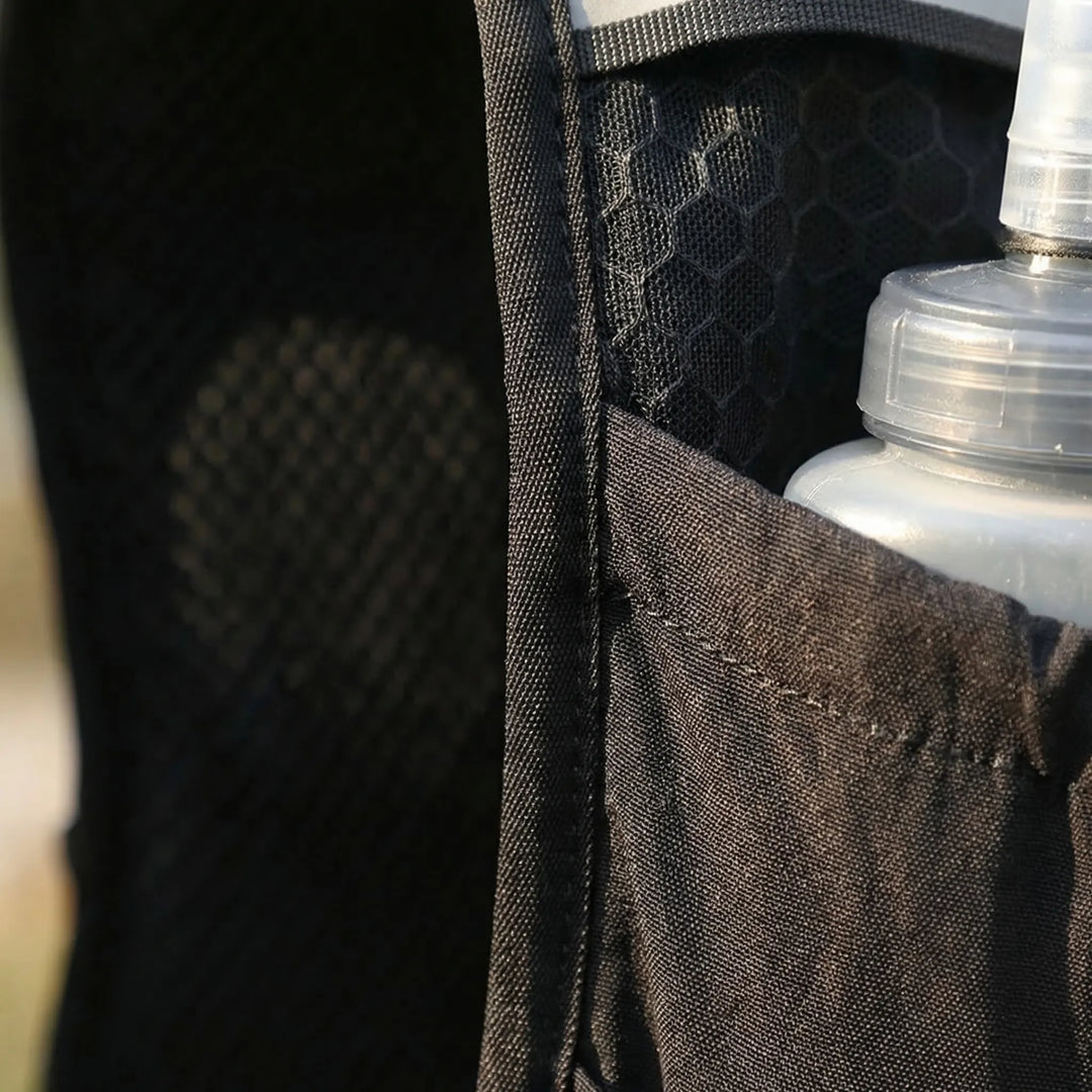 Unisex athletic running vest, lightweight design for fitness, trail running, & marathon training.