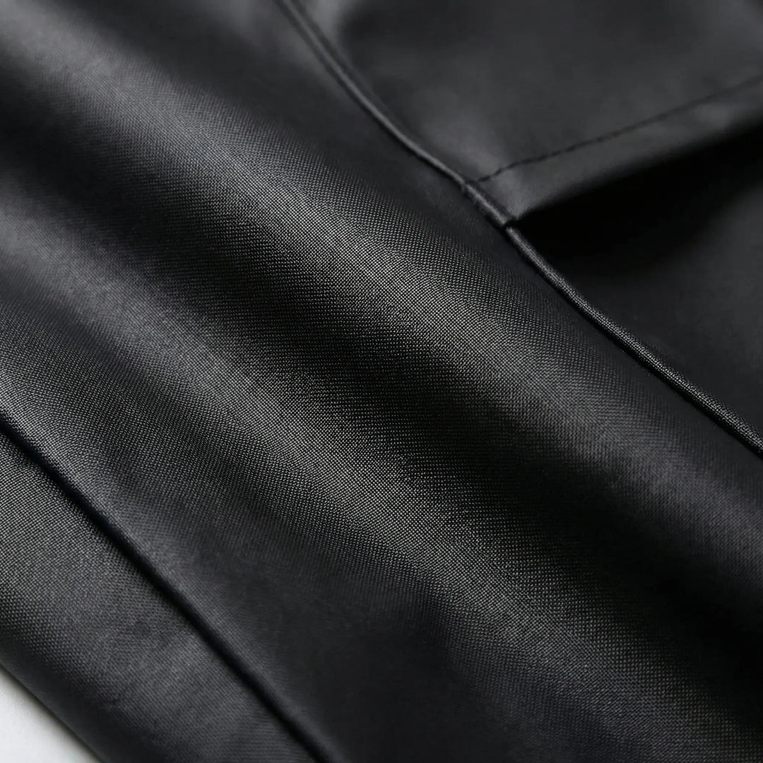 Hooded waterproof rain jacket with full-length coverage for riding, ideal protective apparel for wet weather.