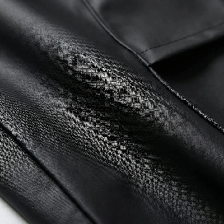 Hooded waterproof rain jacket with full-length coverage for riding, ideal protective apparel for wet weather.