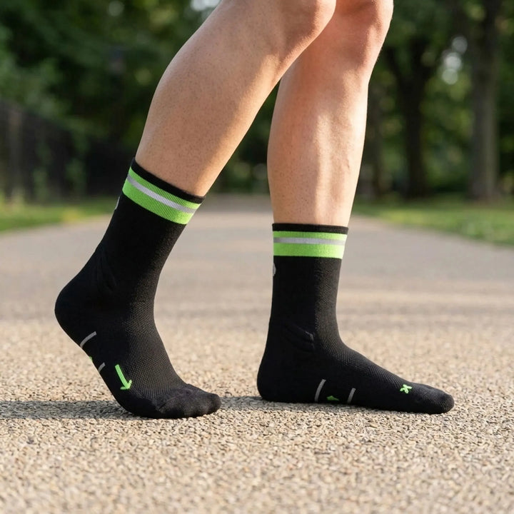 Unisex mid-calf athletic compression socks for running, cycling, and performance sports activities.