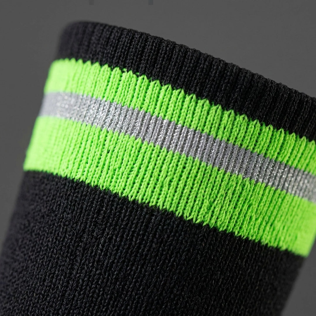 Unisex mid-calf athletic compression socks worn during a run, providing support for performance and recovery.