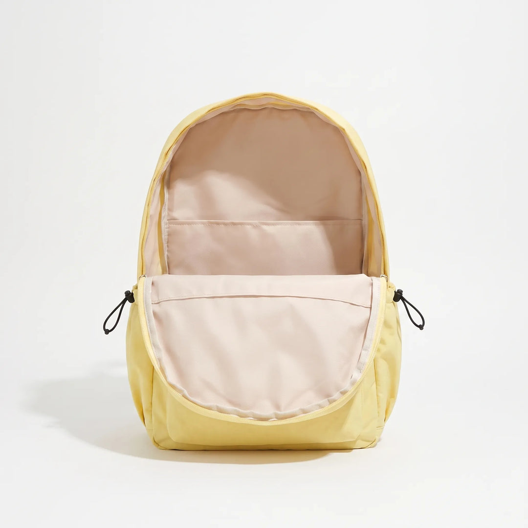 Lightweight minimalist nylon backpack, unisex design for daily commute, laptop, or travel. Water-resistant.