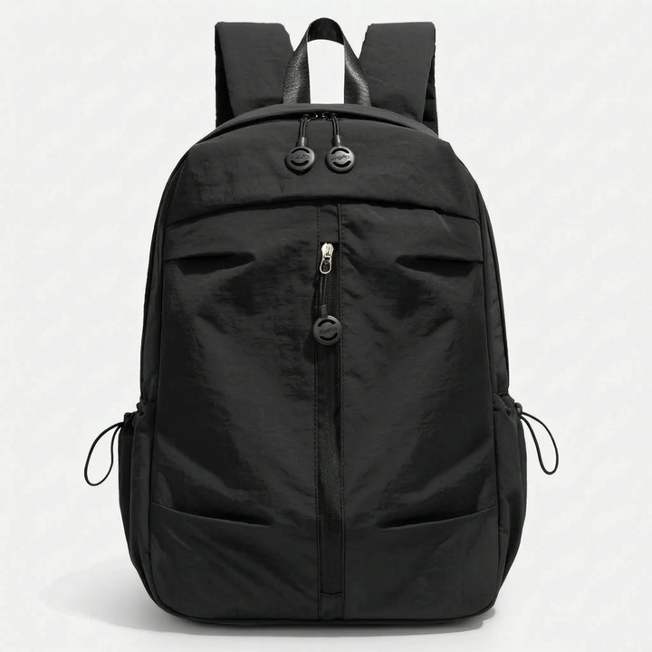 Clean, minimalist unisex backpack for daily essentials. Lightweight, water-resistant nylon for commuting or travel.