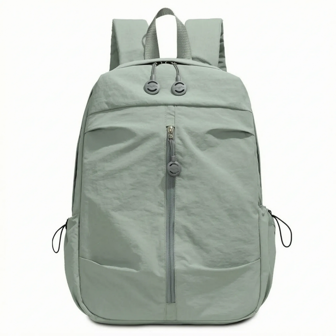 Durable nylon minimalist backpack, unisex styling, perfect for daily commute, travel, & laptop storage.