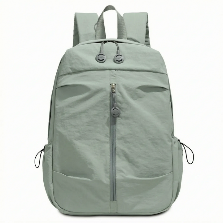 Durable nylon minimalist backpack, unisex styling, perfect for daily commute, travel, & laptop storage.