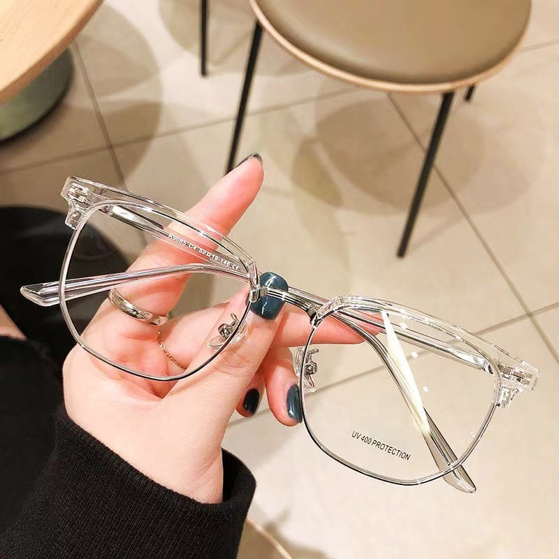 Modern unisex half-rim computer glasses, blocking blue light for comfort.