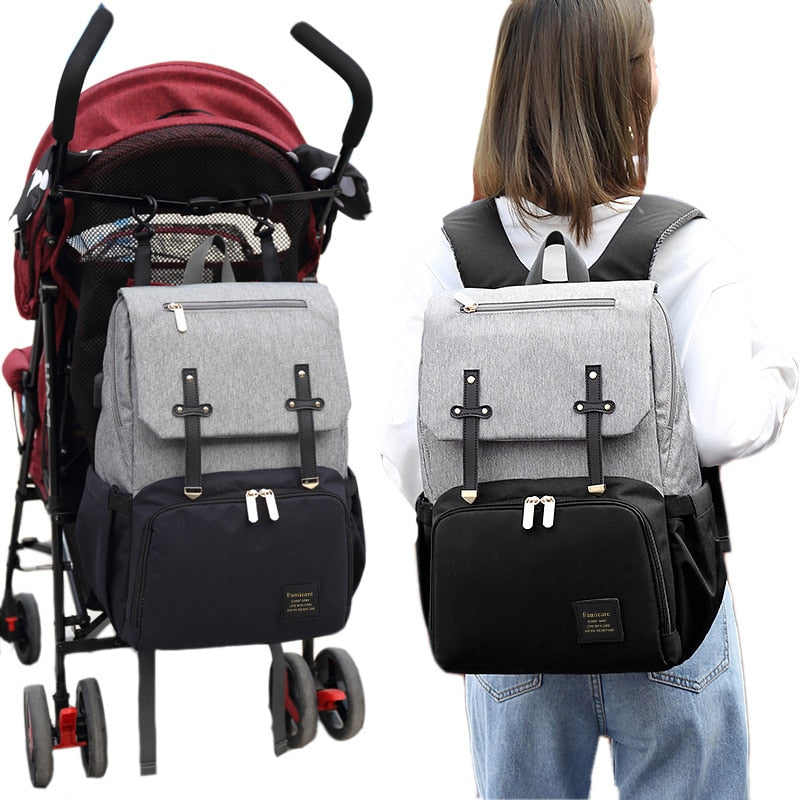 Unisex multi-functional stroller diaper backpack with USB, waterproof fabric, and insulated pockets for baby travel.