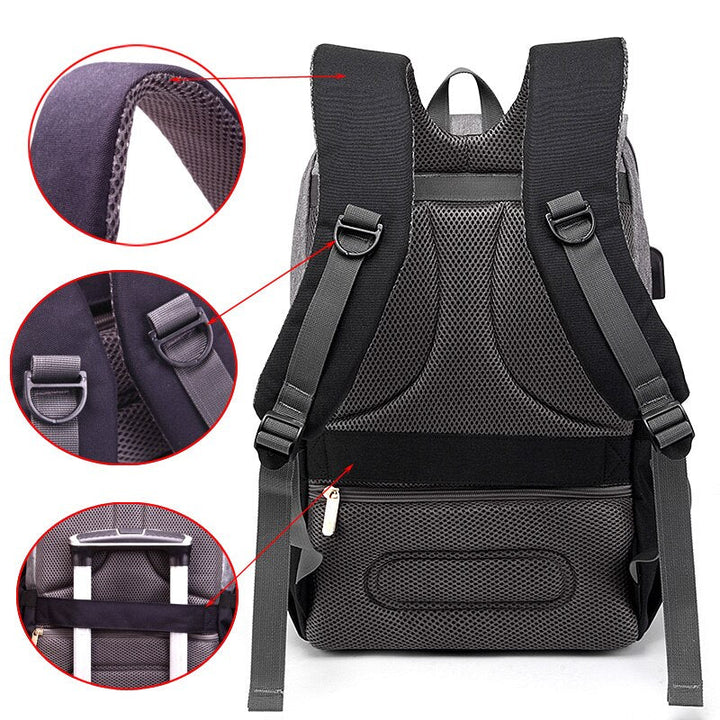 Dad carrying a black unisex diaper backpack on a stroller, showcasing its multi-functional design and organization.