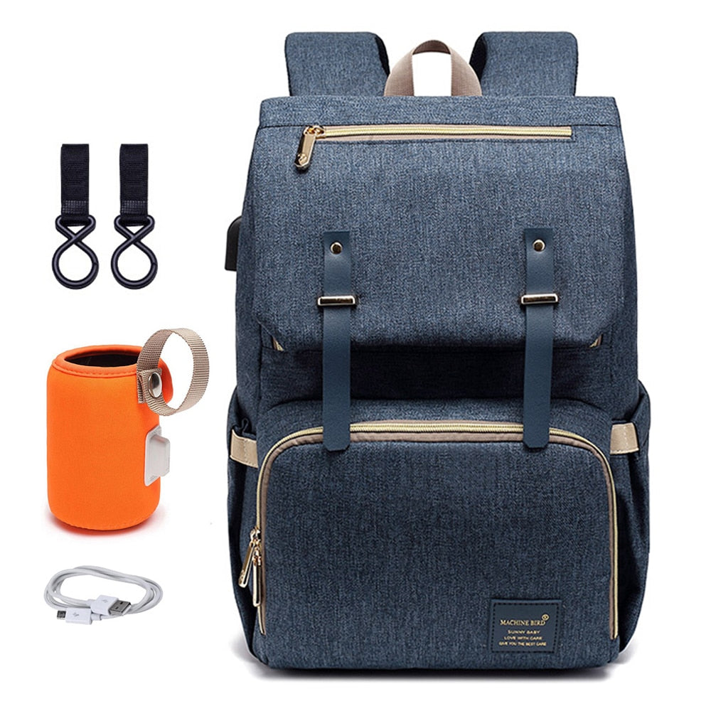 New parent using a unisex diaper backpack, depicting its comfort and style for baby travel essentials.