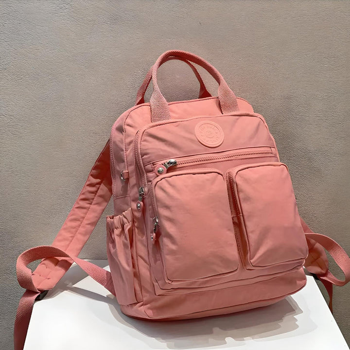 Commuter multi-pocket backpack bag for organized daily essentials. Durable & comfortable unisex design.