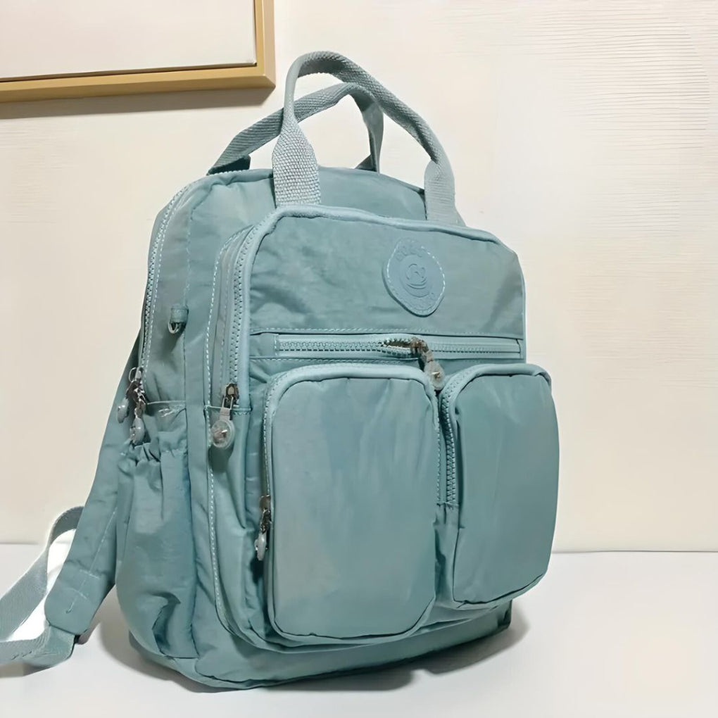 Durable multi-pocket backpack, comfortable for daily carry & travel. Organized storage for all essentials.