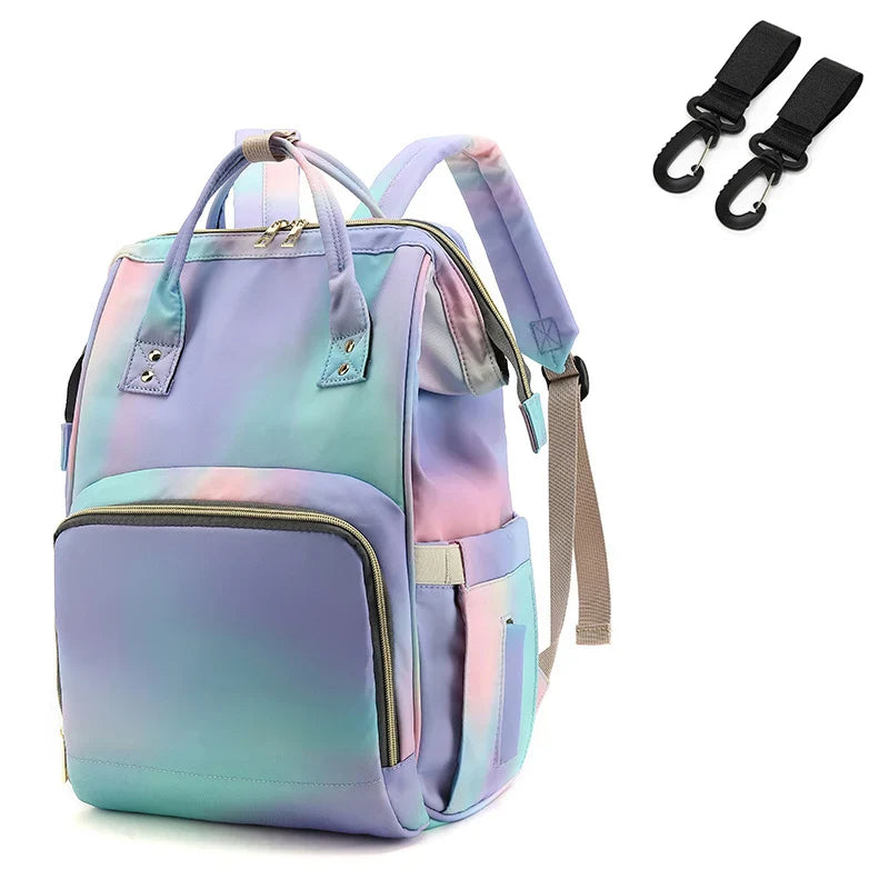 Parent packing a unisex nappy backpack with baby accessories, organized and efficient