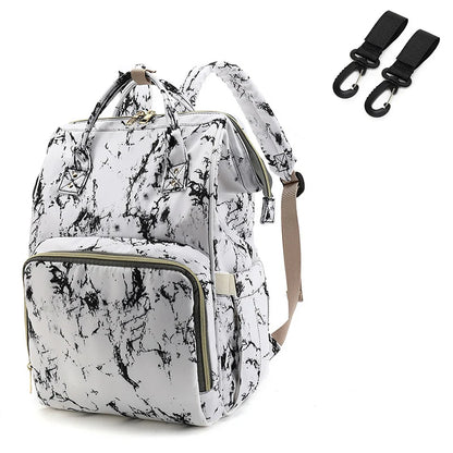 Unisex multifunction baby backpack in a natural outdoor setting, ready for adventure