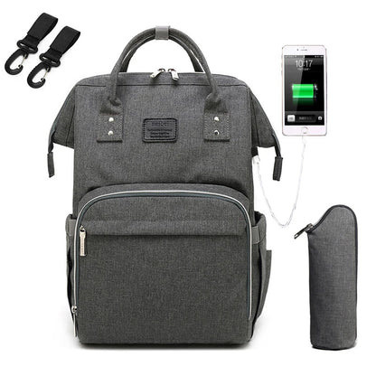 Detail of a padded back panel on a unisex multifunction nappy backpack for comfort