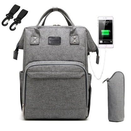 Unisex diaper bag with dedicated wipes dispenser pocket, quick access for parents