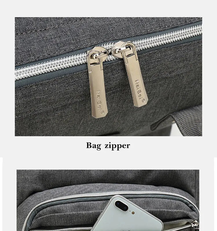 Detail of a D-ring attachment point on a unisex nappy backpack for stroller clips