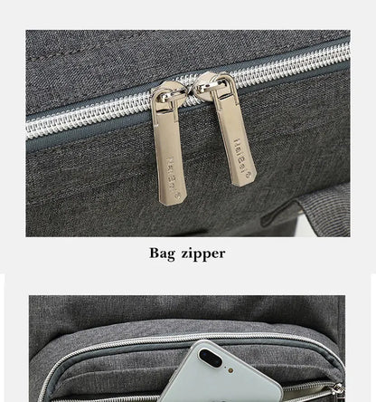 Detail of a D-ring attachment point on a unisex nappy backpack for stroller clips
